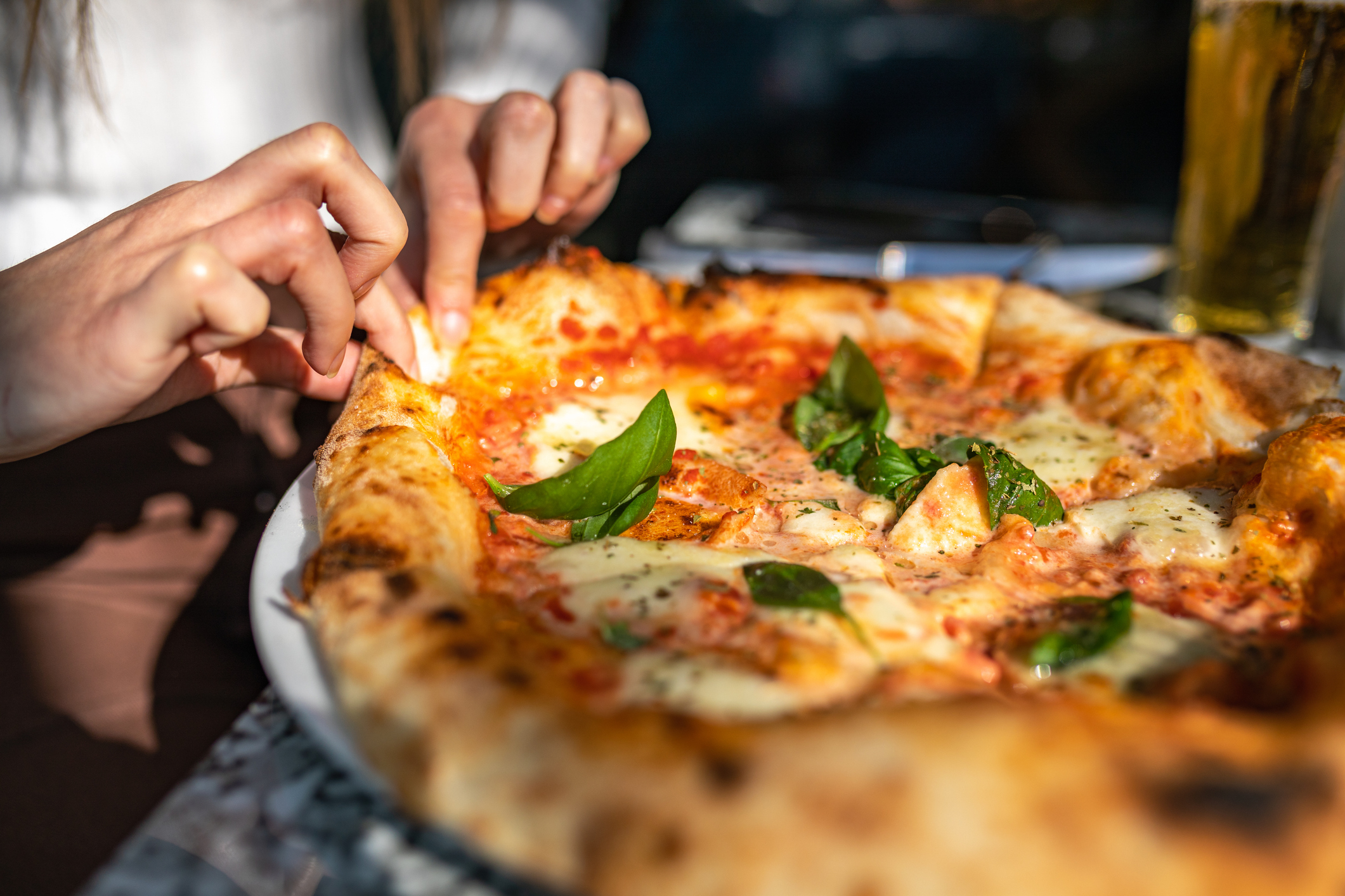 taking-slice-pizza